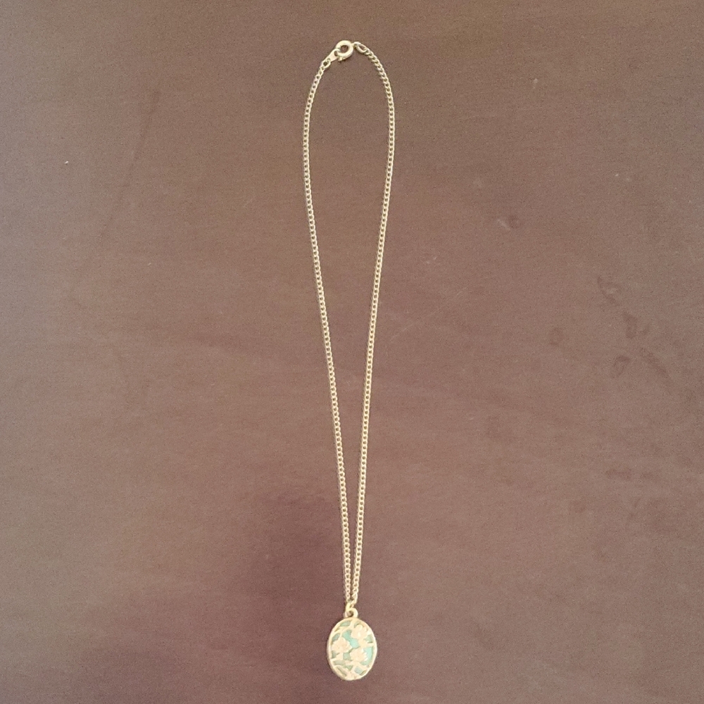 Gold Pendant Necklace with Intricate Design